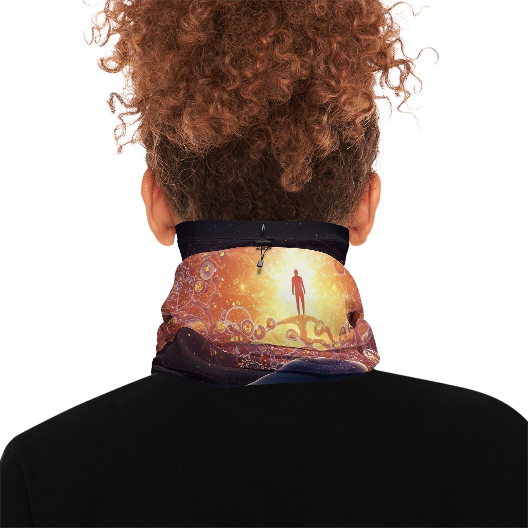 Person wearing a neck gaiter with a scenic design on a white background